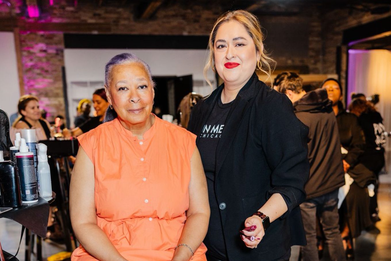 An attendee of the Daisie Foundation/CHA Mother’s Day Makeover Experience smiles after her makeover at Venue West, May 6, 2025.