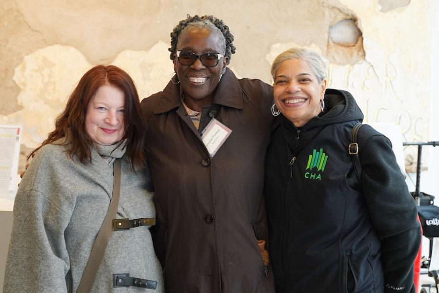 CHA Resident Engagement Manager Crystal Palmer (center) is a tireless champion for CHA residents and a strong advocate for the creation of the National Public Housing Museum.